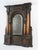 Mirror from the XVIIth century in carved wood, colonnaded decorations, beveled mirror, (bag of small elements to glue). H:...