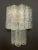 Pair of Italian wall lights with vintage textured Murano glass tubes mounted on newly made gold finish metal frames / Made...
