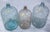 Vintage Set of Three Hand Blown Glass Demijohns. The largest demijohn features embossed Great Bear Spring Co.. Dimension...