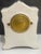 This is an antique Ansonia "Chemung" porcelain mantel clock, likely dating from around 1900.