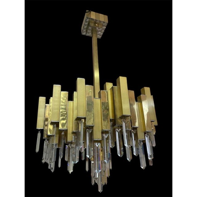 An exceptional, exclusive limited serie of bd lumica lamp from the 70s. This chandelier is listed in catalog named " dona...