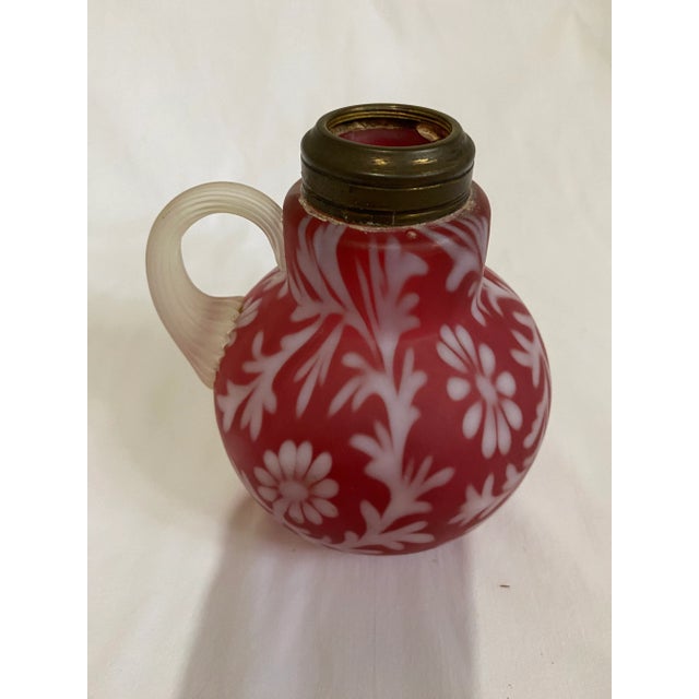Antique cranberry art glass possibly made for a kerosine lantern, makes a wonderful modern day bud vase.