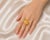 Elegant 14K yellow brushed gold cocktail ring featuring 7 brilliant round diamonds totaling 0.4 carats in a floral-...