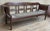 About Rare midcentury sofa, settee or bench in the Spanish style with cane back. Shown in original condition, please note...