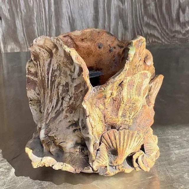 Add a touch of coastal charm to your space with this stunning vintage Boho Coastal Studio Pottery Vase. Featuring an...