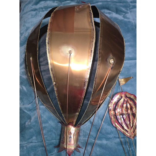 The Vintage Simmons Brass Hot Air Balloon Sculpture is a large, brutalist art piece made of brass, measuring 35 inches in...