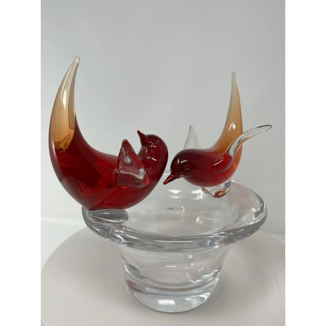 Wonderful decorative piece of Murano Glass. Beautiful red birds on a nest. Signed. Measures 9.5” x 9.5”.