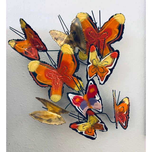 An exceptional and highly collectible signed Curtis Jeré butterfly wall sculpture, dated 1967, featuring a lively...