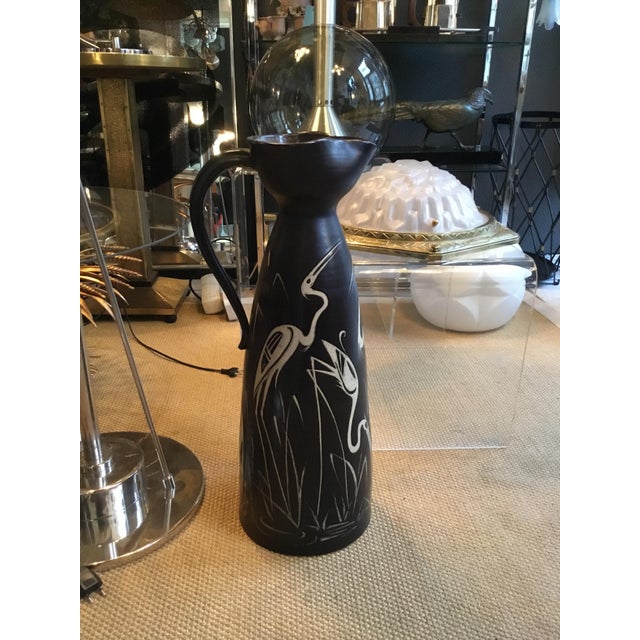 Large floor vase, black overlay glaze. Important studio ceramics from Switzerland in the 1950s. This piece has an...