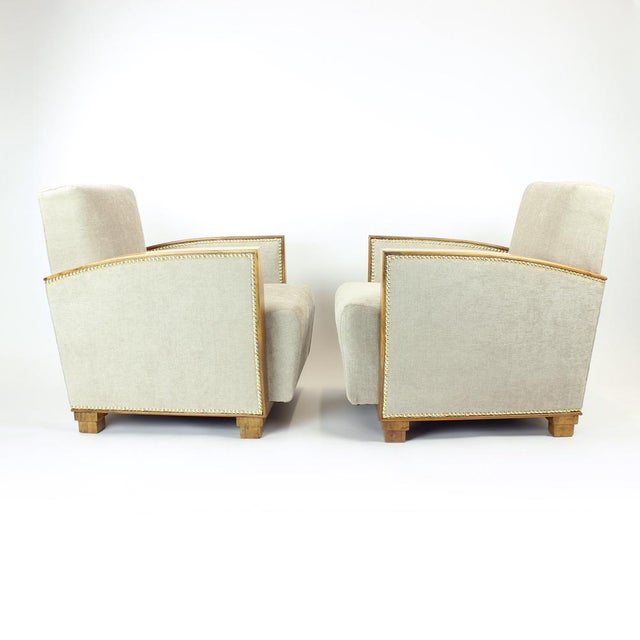 A striking pair of Art Deco armchairs produced in Czechoslovakia in 1930s, expertly and completely restored. The chairs...
