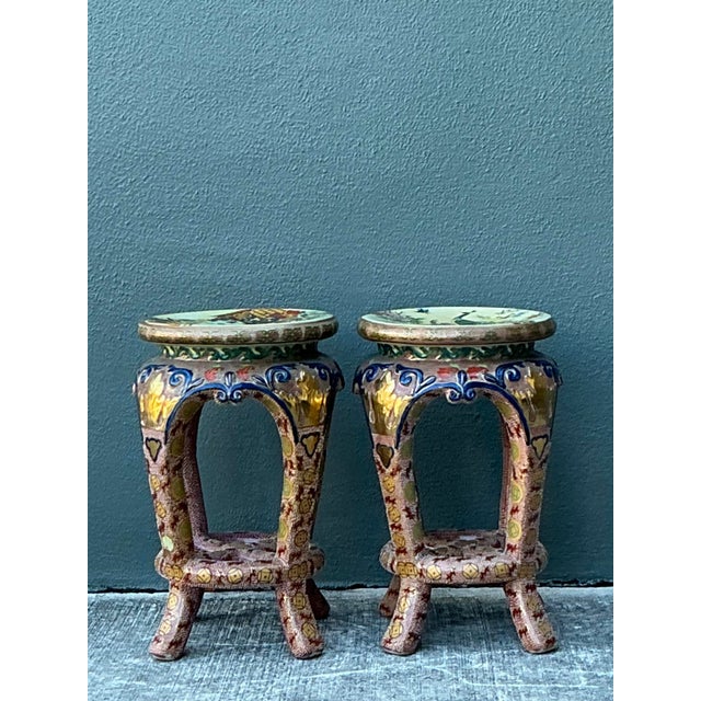 Elevate your home’s aesthetic with this striking pair of vintage Chinoiserie glazed ceramic low stools. Each stool...