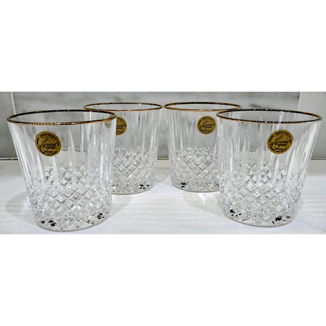 Bring French elegance to your bar cart with these four 1997 Cristal d’Arques “Constance Gold” lowball glasses. Clear lead...