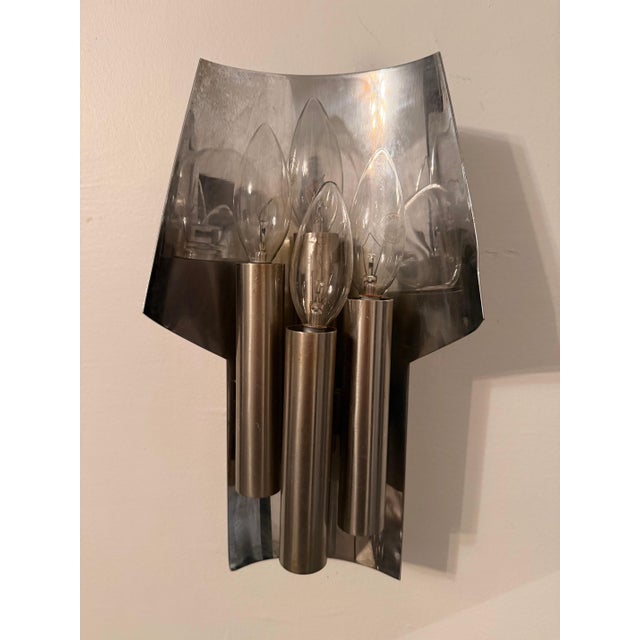 A rare 1960s French Mid Century wall lights in chrome and steel with 5 lights sockets with the holders in a slightly...
