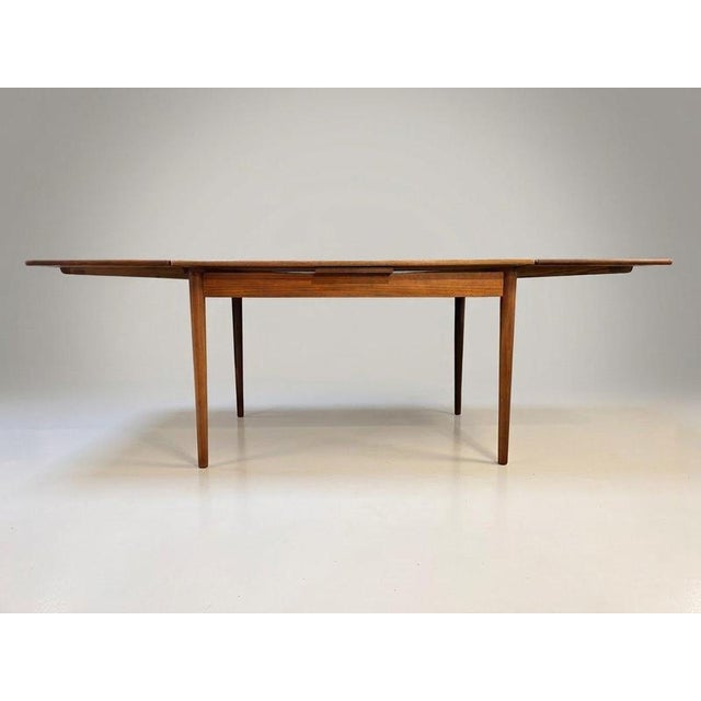 Introduce iconic Scandinavian elegance to your space with this exceptional Danish dining table, crafted in the 1960s from...