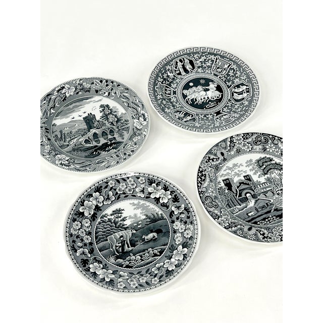 Pretty set of 4 Spode black and white 10.5" dinner plates. The Archive Collection - "Castle", "Milk Maid", "Greek" and...