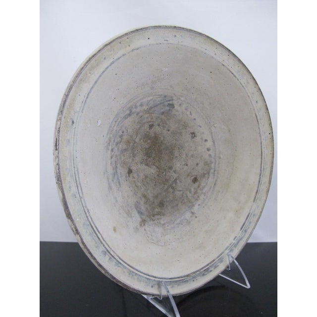 Southeast Asian rustic bowl, crafted in the distinctive Thailand Sukhothai style. This is an antique piece created to...
