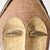 The Kwele Ekuk Mask, a profound cultural emblem hailing from Gabon's Kwele people, represents a key facet of their society...