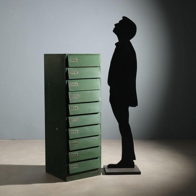 1960s industrial chest of drawers in enameled metal, featuring a simple and functional design typical of the period....