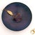 This charming vintage enamel bowl features a captivating blue and purple swirl design. Its round shape and generous size...