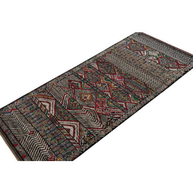 Hand-knotted in wool and silk, this 5x12 rug is a new addition to the Moroccan Collection by Rug & Kilim. On the Design...