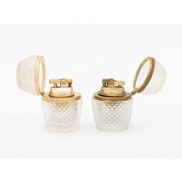 Set of Five French Gilt Metal Mounted Crystal Table Lighters. 3.75" H x 2.5" Diameter. Provenance: From a West End Avenue...