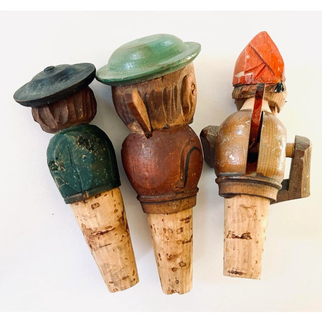 These charming hand carved and painted fellas are typically from area around Germany. But the chap with the red cap could...