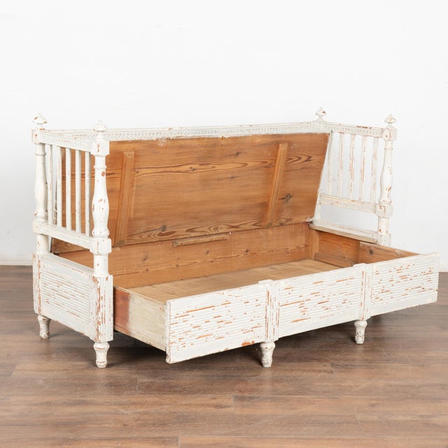 This lovely bench is a wonderful example of Swedish Gustavian craftsmanship with turned finials and feet adding to the...