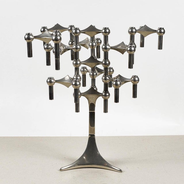 This iconic orion modular candelabra, designed by fritz nagel and ceasar stoffi for bmf, represents a cornerstone of...