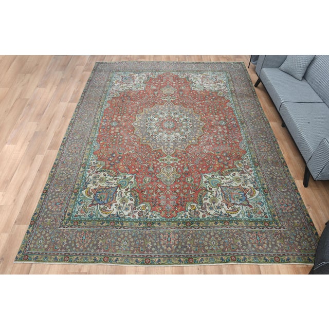 Vintage Persian Hand-Knotted vintage rug is a semi-antique vintage area rug. The '70s Eastern region of Turkey's unique...