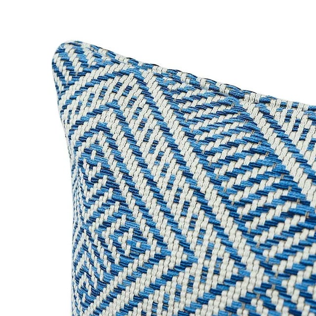This pillow features Tortola with a Knife Edge finish. Inspired by basket designs, this concentric diamond pattern is...