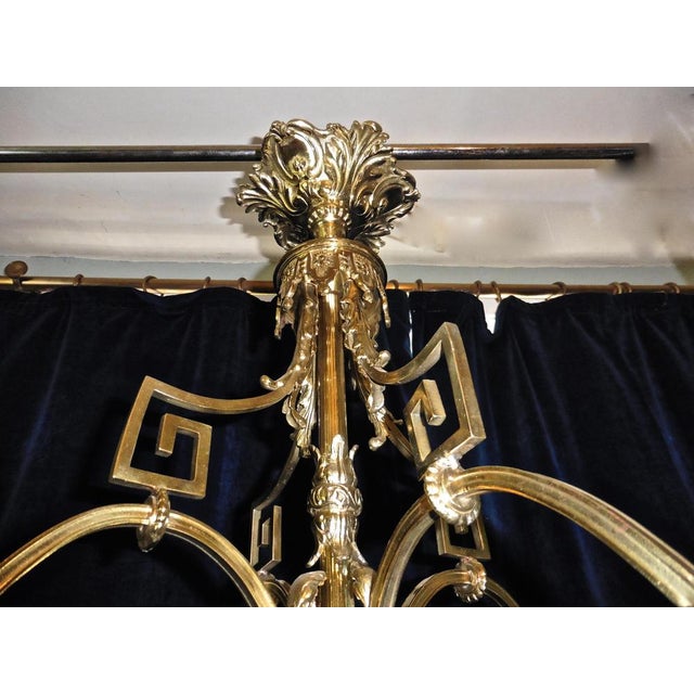 A French gilded brass Rococo chandelier. This is an excellent quality and very large piece it is very heavy and has a...