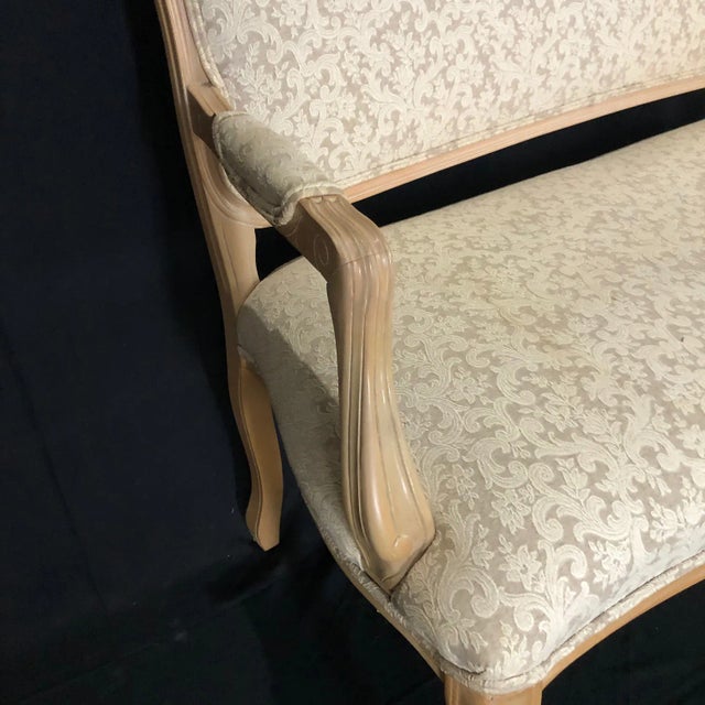 Louis XIV style French loveseat having solid beige painted frame and lovely neutral patterned upholstery. #5164