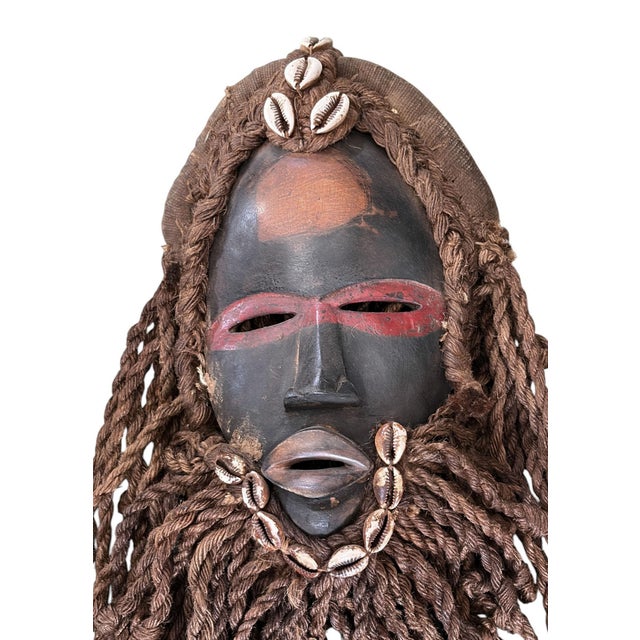 This exceptional piece of African art is a ceremonial dance mask from the Dan people of the Ivory Coast, including their...