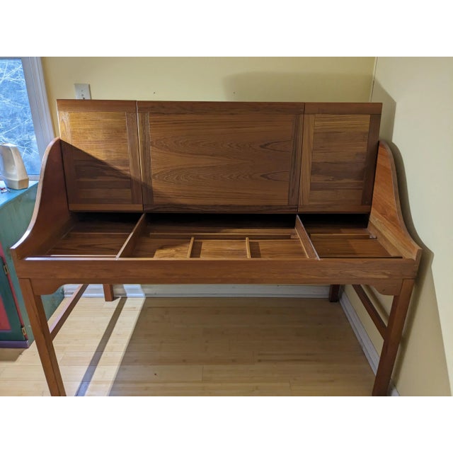 Beautiful mid-century modern solid teak writing desk by Andreas Hansen. Leather pad on top has some scratches but the rest...