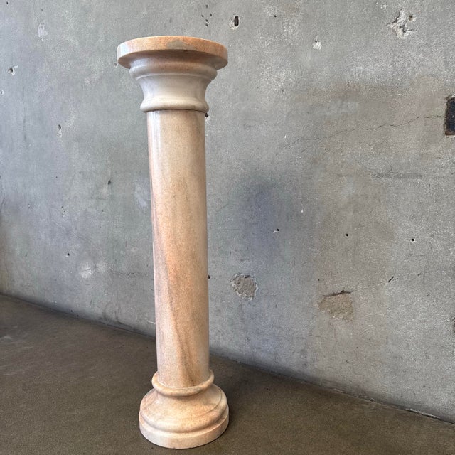 Add a touch of timeless elegance to your space with this exquisite vintage blush marble pedestal, crafted in Italy....