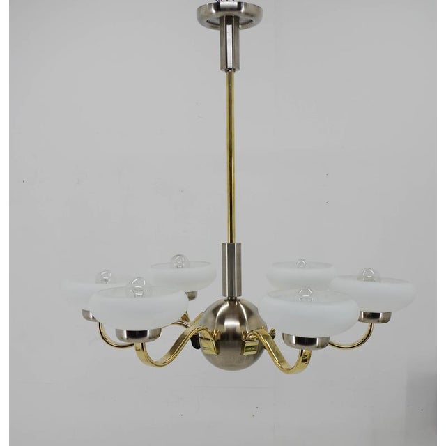 Large beautiful Art Deco chandelier made in 1930s. Restored: nickel with minor age patina polished. Brass arms polished....