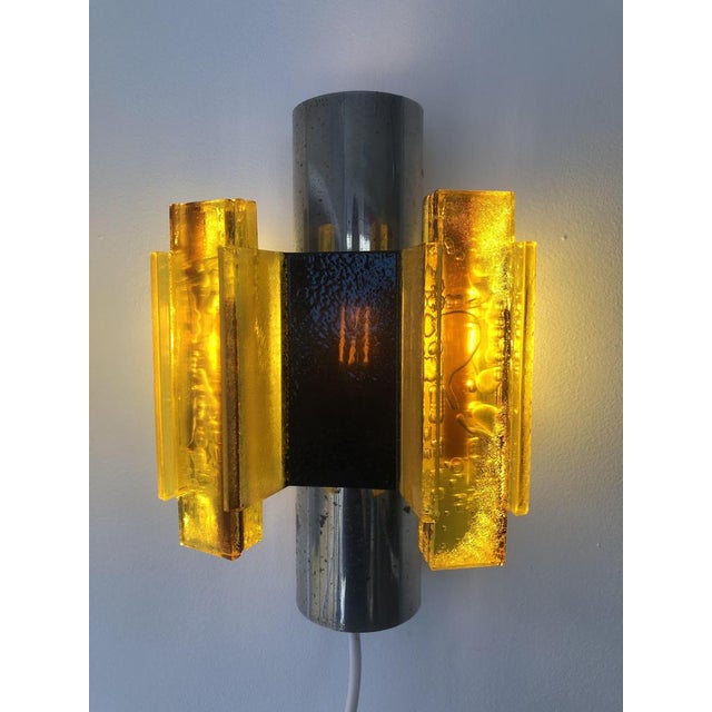 Dazzling Space Age design from Denmark, is this pair of Brutalist amber wall lights with switches on the cord for easy...