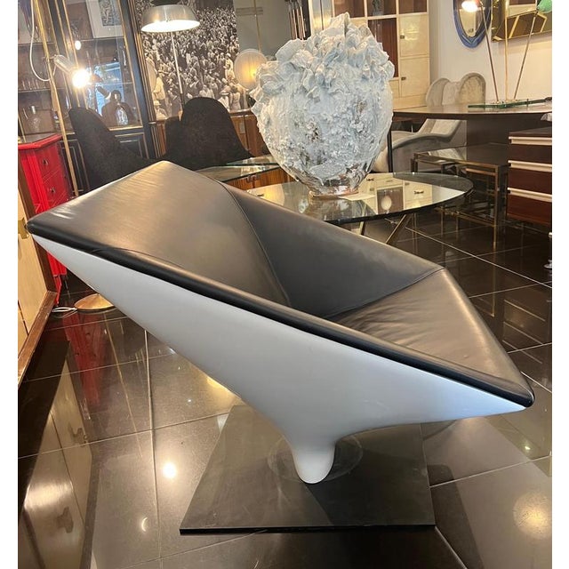 This fabulous armchair was designed in Italy circa 1970s. The structure is made from moulded white fibreglass upholstered...