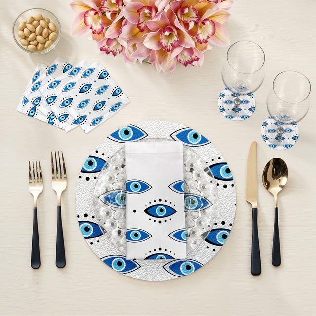 Introducing the Ultimate Evil Eye White Pebble Placemats, providing both style and protection. Channel the mystical vibes...