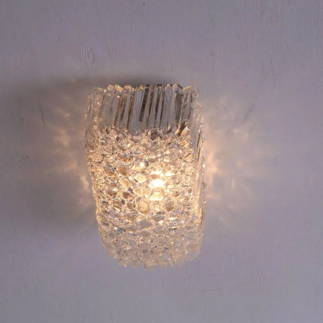 Beautiful and rare set of 4 bubble glass wall lamps or sconces designed by Helena Tynell for Glashütte Limburg. The lamps...