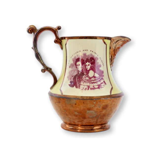 This striking English copper lustre jug commemorates the marriage of Queen Victoria and Prince Albert in 1840—one of the...