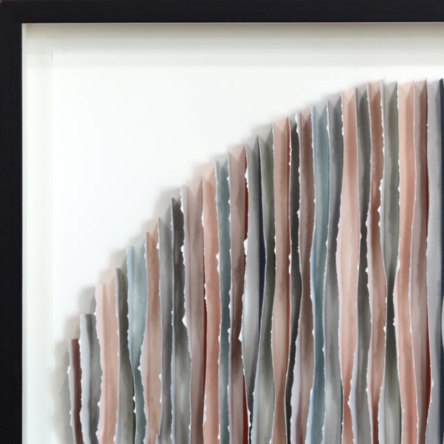 Krista Reuter's contemporary paper sculpture artworks unfold like a quiet study in light, shadow, texture, and dimensional...