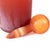 Vases in a vibrant tangerine color, adorned with a matte coating for a textured look. These exquisite vases can be grouped...