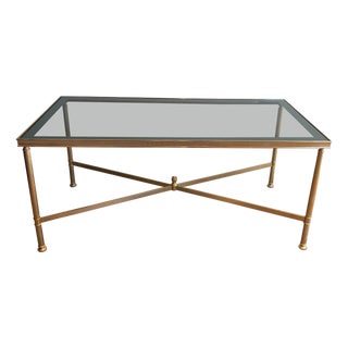 1940s Neoclassical style gold metal coffee table with blueish glass top For Sale