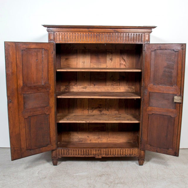 French Rare 18th Century French Period Louis XVI Carved Walnut Armoire From Limoges For Sale - Image 3 of 17