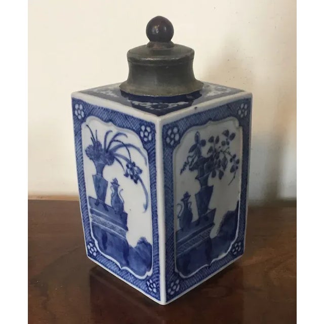 Antique early 19th century Chinese export porcelain tea caddy. Each side decorated with a reserve painting of vases. Nice...
