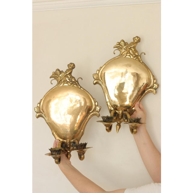 Stunning pair of Swedish brass sconces, featuring beautiful detailing. Both sconces are in very good vintage condition...