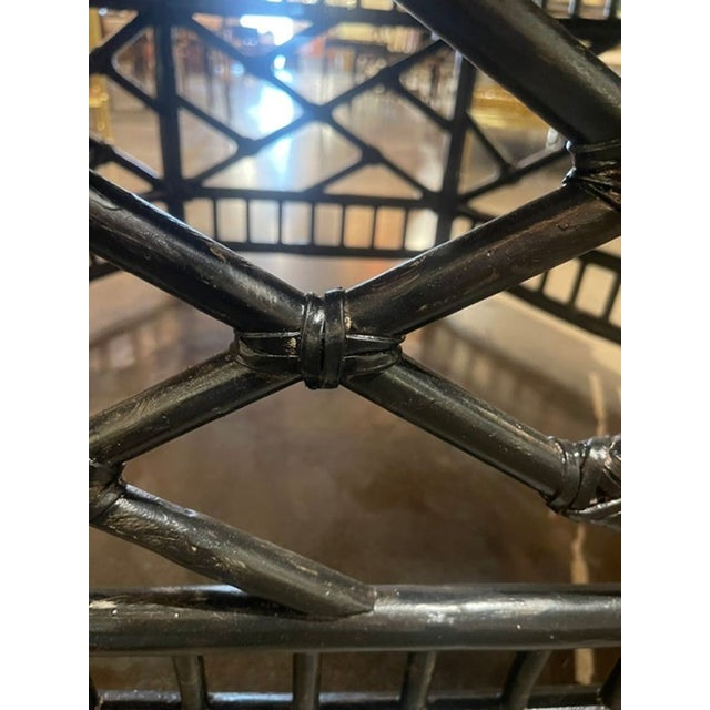 The Vintage Italian Hexagonal Bamboo Low Table is a stylish piece of furniture perfect for adults. Made of black bamboo,...
