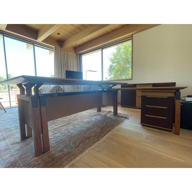 Italian executive desk by Mariani. Modular desk assembles in pieces for easy adjustments and moving. Camel leather has...