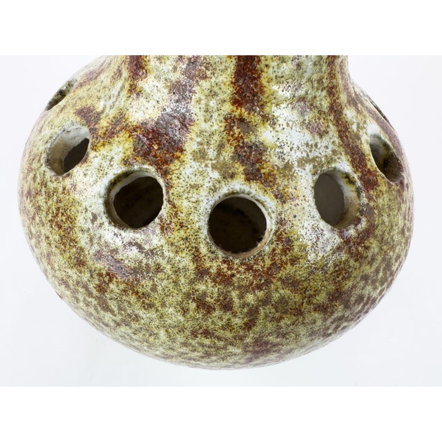 Ceramic flower frog (pique-fleurs) vase produced by Les Potiers d’Accolay, France, circa 1960s. The vase features a...